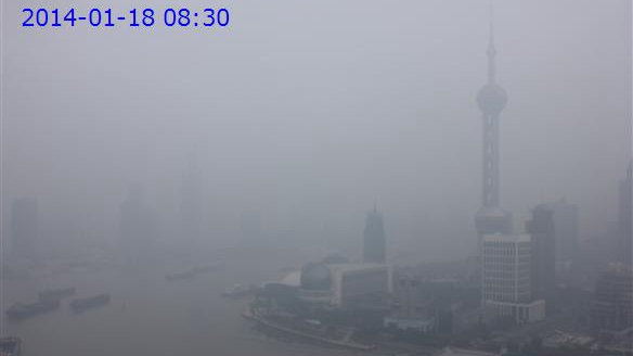 申城今早中度污染 预计下午转良